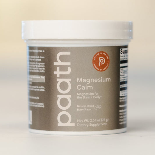 Container of paath Magnesium Calm supplement on a beige background